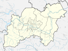 Mapa konturowa powiatu ostrowieckiego, blisko centrum po prawej na dole znajduje się punkt z opisem „Ćmielów”