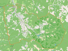 Mapa konturowa miasta Wisła, blisko prawej krawiędzi nieco na dole znajduje się punkt z opisem „źródło”, natomiast blisko centrum na dole znajduje się punkt z opisem „ujście”