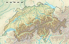 Mapa konturowa Szwajcarii, blisko dolnej krawiędzi znajduje się czarny trójkącik z opisem „Castor”