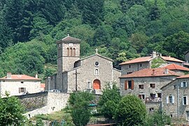 The church and surrounding buildings in Saint-Julien-Vocance