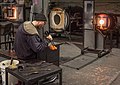 Image 5Glass blower. This was moments before he accidentally dropped it. Heartbreaking (and vasebreaking). Talented folks here, though, and I actually went back a while later and took a class. Got a piece of lit up frozen spaghetti to prove it.