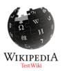 Wikipedia logo displaying the name "Wikipedia" and the words "Test Wiki" below it, in red, in English