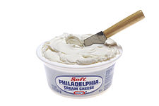 Fresh cream cheese sauce in a tub